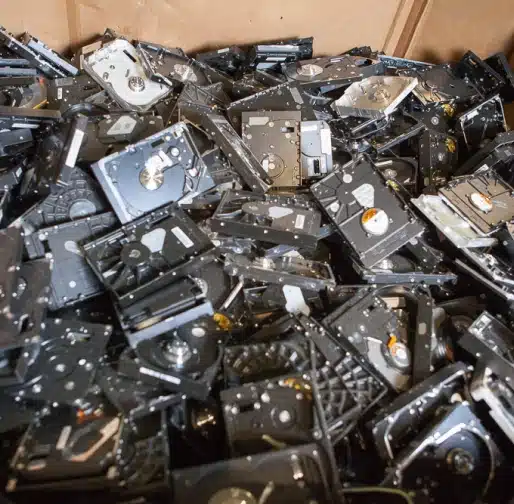 Pile of collected electronic waste at a community recycling event